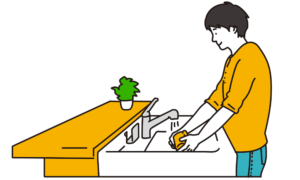食器を洗いをしている男性